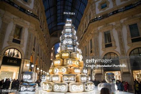 Activists Throw Orange Paint on Gucci's Christmas Tree in Milan